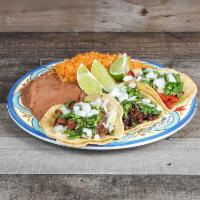 Taco Plate Beef Fajita  · 3 tacos meat of choice of meat, rice and beans