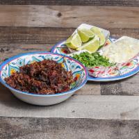 Barbacoa Taco · Homemade beef barbacoa, double tortilla, onion, cilantro and lime