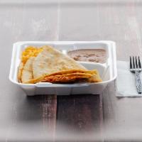 Fajita Beef Quesadilla · 14 inch tortilla folded and fill with quesadilla cheese and beef fajita meat, side of rice a...