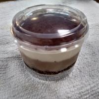 Tiramisu  · Coffee and zabaglione cream on a layer of sponge cake soaked in espresso. Dusted with cocoa ...