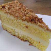 Toasted Almond Cake · This 2 layer sponge cake is delicately soaked in amaretto syrup layered with imported mascar...
