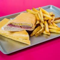 Cuban Sandwich (Cubano) · Roasted pork, ham, swiss cheese, pickles and mustard on toasted Cuban bread