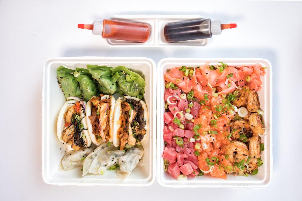 SEAFOOD  · For 4-5 people. 
1st Box: 3 proteins - raw tuna, raw salmon, grilled shrimp & ginger. 
2nd Box: 3 bao buns  - beef, spicy pork & shrimp /  8 pcs dumplings each (beef & kale)
3rd Box: white rice, bb rice - brown & black, japchae noodle 
sauce - our classic red poke & yuja chojang 