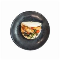 Shrimp Bun · grilled shrimp, red onion, pickled radishes, sesame aioli, toasted seaweed, golden crispy sh...