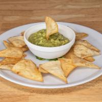 Guacamole Dip · Fresh homemade guacamole served with crispy flour tortilla chips. Vegetarian.