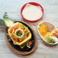 Hawaiian Fajita · Pineapple with your choice of protein and vegetables. Served with Mexican rice, flour tortil...