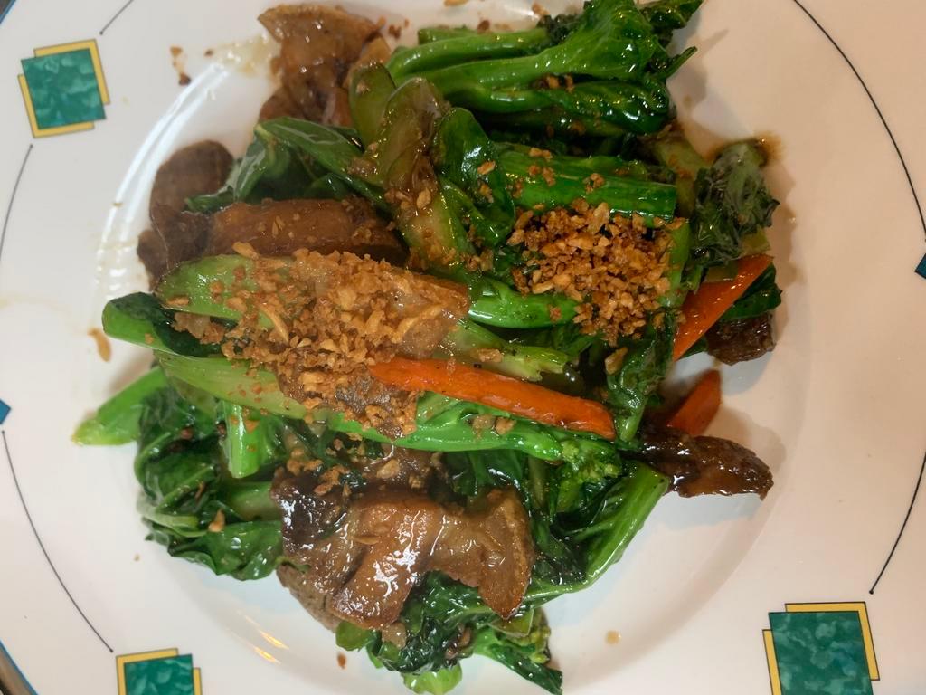 33. Crispy Pork Belly with Chinese Broccoli · Khana moo krob. Crispy pork belly stir-fried with brown sauce.