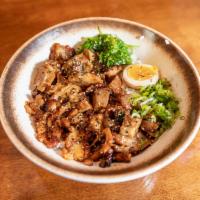 2. Chashu Don · Seasoned pork belly, green onion, seasoned egg, sesame seed, seaweed salad with don sauce.