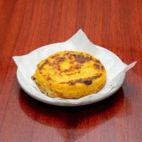 Huevos al Gusto and Arepa con Queso · Checkmark. Arepa topped with cheese and butter and a side of eggs with your choice of hot co...