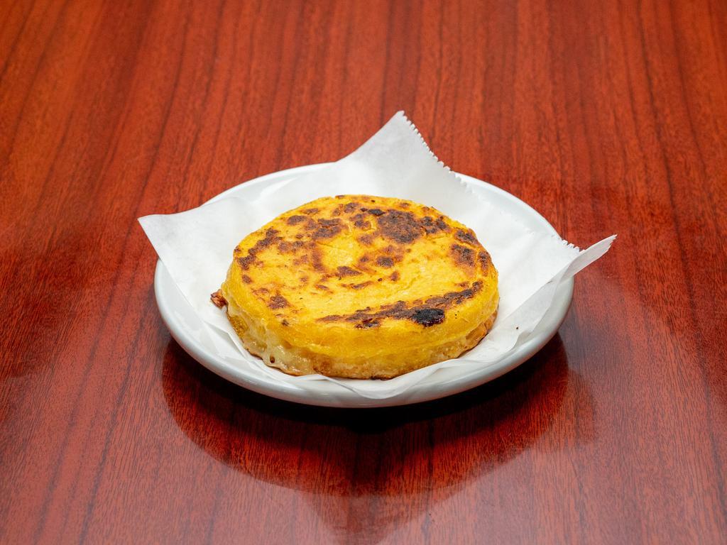 Huevos al Gusto and Arepa con Queso · Checkmark. Arepa topped with cheese and butter and a side of eggs with your choice of hot coffee with milk or hot chocolate.