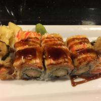 Giuliana Roll · Shrimp tempura inside with spicy kani on top.