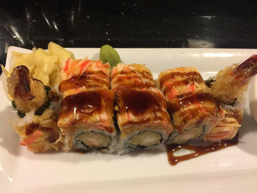 Giuliana Roll · Shrimp tempura inside with spicy kani on top.