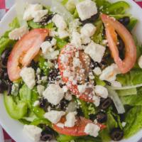 Greek Salad · Lettuce, tomatoes, onions, black olives, green peppers and feta cheese.