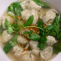 Wonton Soup · Ground pork and shrimp wrapped in wonton wrapper and spinach topped with garlic.