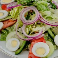 Garden Salad · Fresh spring mix lettuce, cherry tomatoes, green peppers, onion, cucumbers, and an egg.
