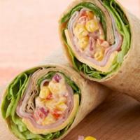 Tuna Wrap · Our famous homemade white tuna salad, shredded lettuce, and tomatoes.
