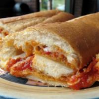 Eggplant Parmigiana Grinder · Eggplant topped with cheese and tomato sauce.
