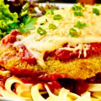 Meatball Parmesan Dinner · Served with side salad and garlic bread.