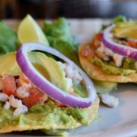 Single Ceviche Tostada · A single Crispy tostada covered in guacamole and topped with our fresh ceviche