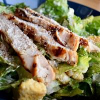 Mexican Caesar Salad · A large bowl of crisp romaine lettuce tossed in Caesar dressing, shaved Parmesan cheese and ...