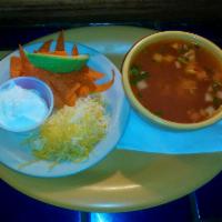 Chicken Tortilla Soup · Our large bowl of chicken tortilla soup is loaded with shredded chicken, onions, tomatoes, a...
