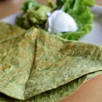 Spinach and Mushroom Quesadilla · A grilled spinach infused tortilla stuffed with fresh spinach, mushrooms and Jack cheese. Se...