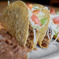 Gringo Taco Platter · Crispy tacos filled with seasoned beef or shredded chicken. Topped with lettuce, tomatoes an...
