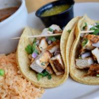 Fajita Taco Platter · Grilled steak or chicken fajita served street style with diced onions, cilantro, and a side ...