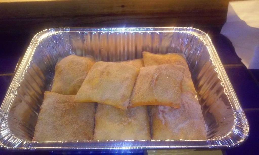 Family Size Sopapillas · Eight puffy fried sopapillas dusted in cinnamon sugar and served with honey.
