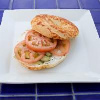 Bomb bagel · Choice of Asiago, everything, or plain bagel with tomato, avocado and cream cheese or hummus.