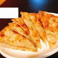 B01. Scallion Pancake 蔥油餅 · Savory folded flatbread. 
