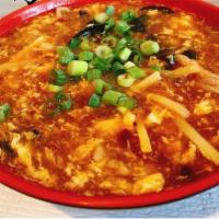 C03. Hot and Sour Soup 酸辣湯 · Spicy.