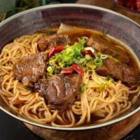 E01. Braised Beef Noodle Soup 紅燒牛肉麵 · Savory light broth with noodles. 