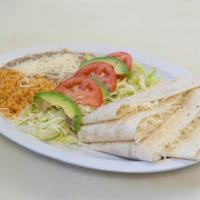 Quesadillas with Everything · Includes lettuce, sour cream, and guacamole.
