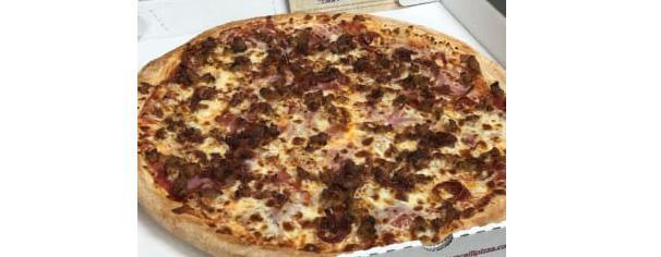 Meat Magnifico Pizza · Pepperoni, ham, capicola, bacon, Italian sausage and mozzarella cheese piled high atop our signature dough and our traditional red pizza sauce.