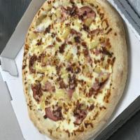 Hawaiian Pizza · Pineapple, ham, bacon and extra mozzarella cheese on our traditional red pizza sauce.