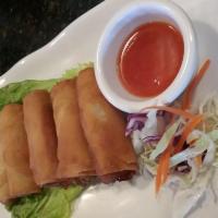 2. Egg Rolls · 5 golden fried rolls stuffed with glass noodles and vegetables or chicken, served with sweet...
