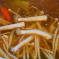20. Tom Yum Soup · Chili and lime soup prepared with lemon grass, mushrooms, onions and cilantro.