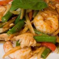 37. Phad Ped · Stir-fried with spicy sauce with bamboo shoot,  green beans, bell peppers, and basil leaves.