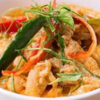 42. Panang Curry · Coconut curry, prepared with a special Thai Panang curry paste, bell pepper, lime leaves and...