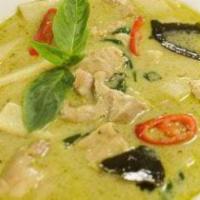 43. Green Curry · Green coconut curry, prepared with sliced green beans,eggplant, bell pepper, lime leaves and...