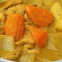45. Yellow Curry · Yellow coconut curry, prepared with potatoes, onions and carrots.