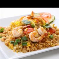 62. Fried Rice · Choice of meat fried rice with egg, white onion and green onion.