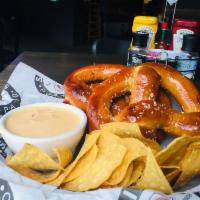 Jumbo Pretzels · One of our most popular appetizers! 2 Giant Bavarian pretzels, white spinach queso, tortilla...