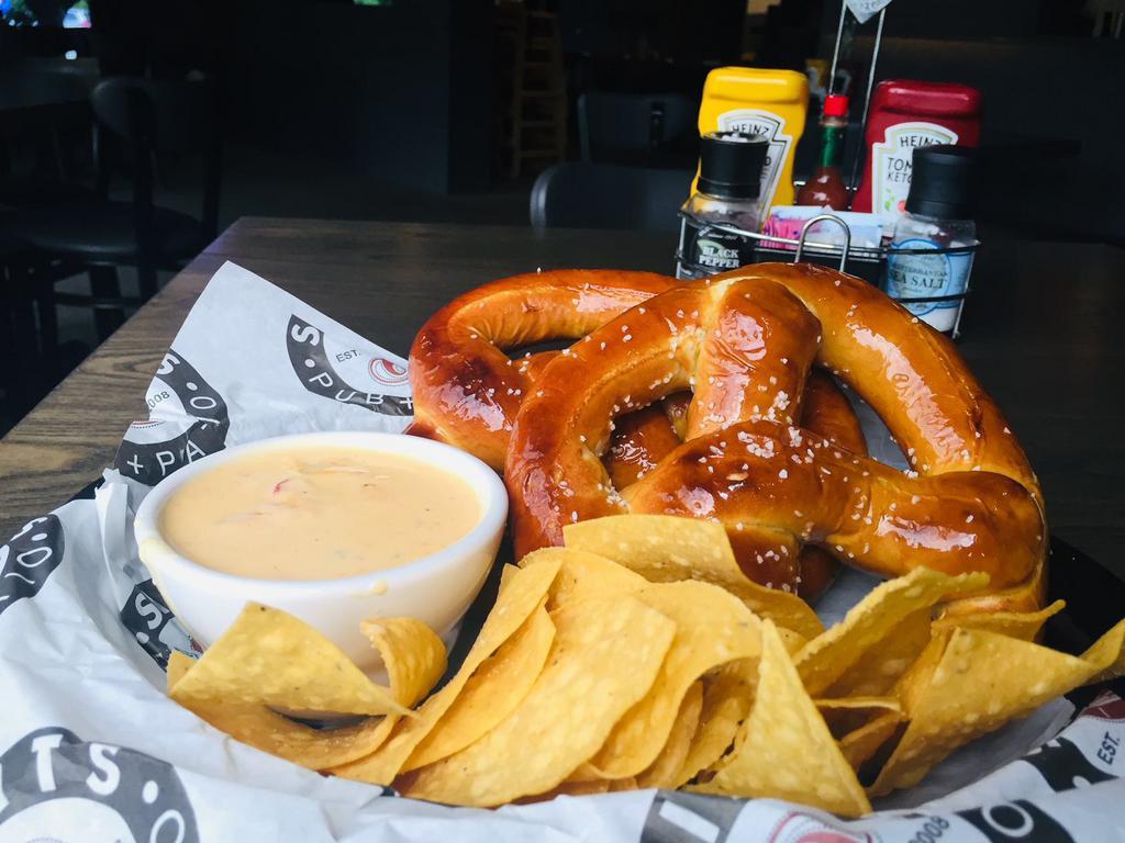 Jumbo Pretzels · One of our most popular appetizers! 2 Giant Bavarian pretzels, white spinach queso, tortilla chips. You won't go hungry with these... excellent for sharing!