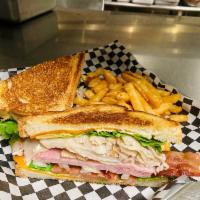Patio Club Sandwich · Turkey, ham, bacon, cheddar, leaf lettuce. Tomato, onion, mayo, served on texas toast