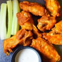 8 Bone-in Wings  · Our juicy wings fried until crispy, choice of wing sauce, choice of dipping sauce and charre...