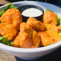 Maverick Shrimp  · Hand-breaded shrimp tossed in our signature boom-boom sauce, or choose another wing sauce, a...