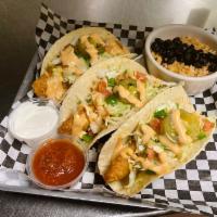 Beer-Battered Fish Tacos (soft shell) · Crispy fried cod, cabbage, pico de gallo, chipotle citrus aioli, black beans and rice.