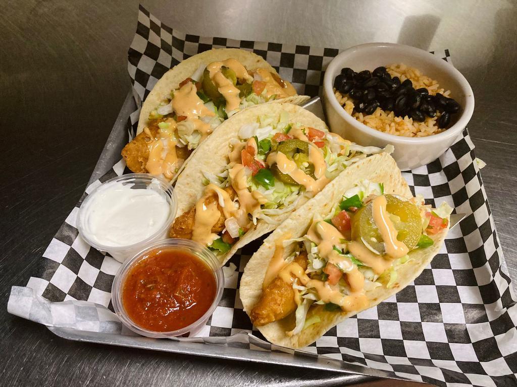 Beer-Battered Fish Tacos (soft shell) · Crispy fried cod, cabbage, pico de gallo, chipotle citrus aioli, black beans and rice.